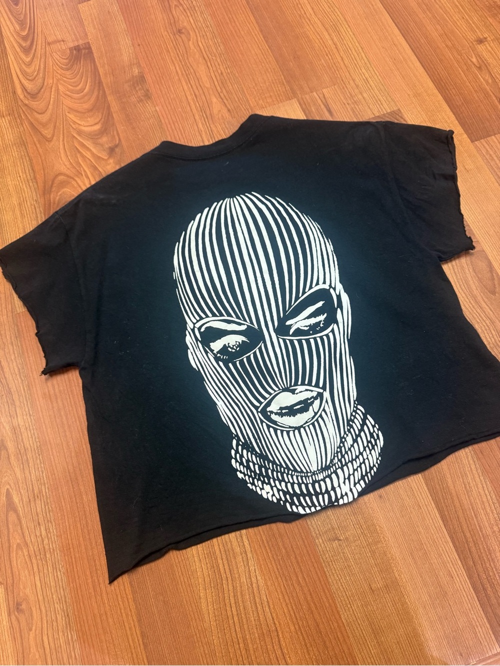 Cropped Black Tee with White Striped Mask Graphic